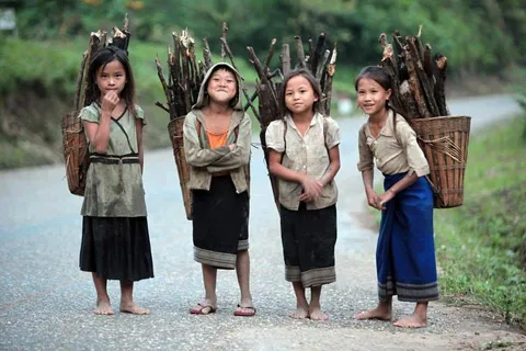 young girls getting wood