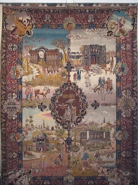 A carpet woven with figures, buildings and decorative borders