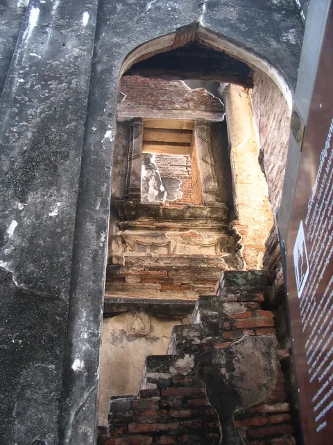 View through a series of doorways in old brick and stone temple walls